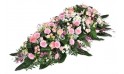 image de la composition de deuil dans les tons roses repos éternel